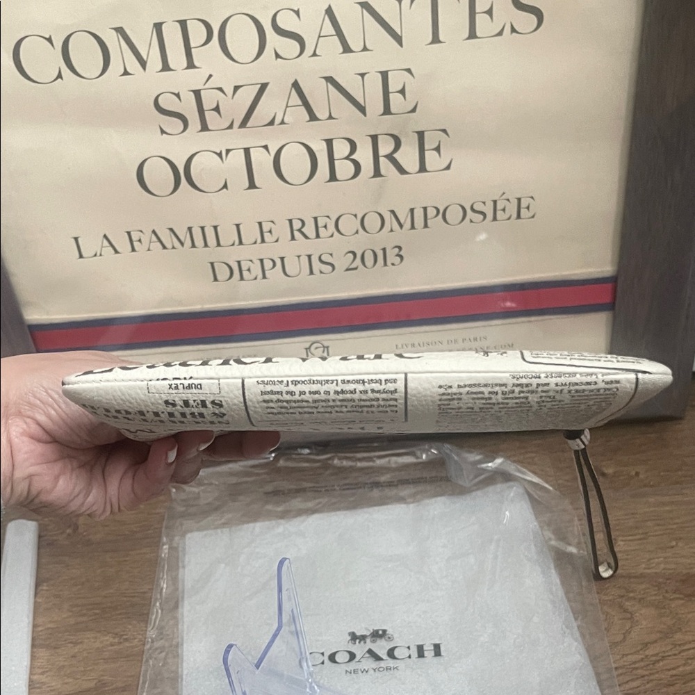 RESERVED🛍️Coach Outlet Large Corner Zip Wristlet with Newspaper Print - Picture 7 of 12